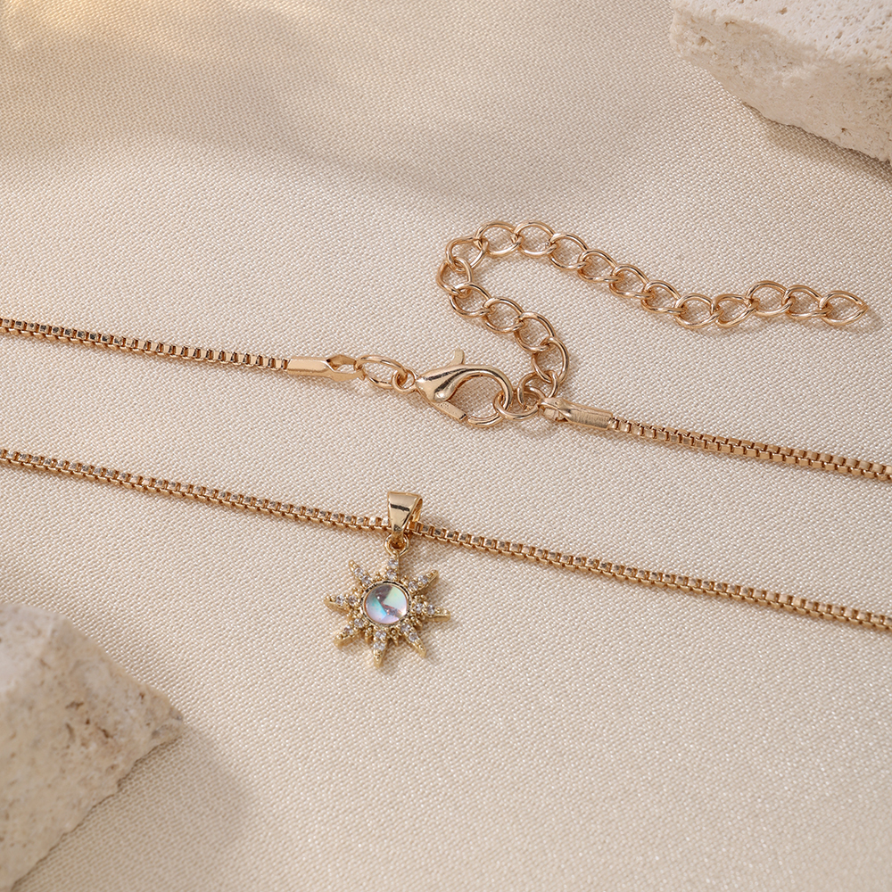 Gold Sunburst Pendant Necklace with Zirconia 4