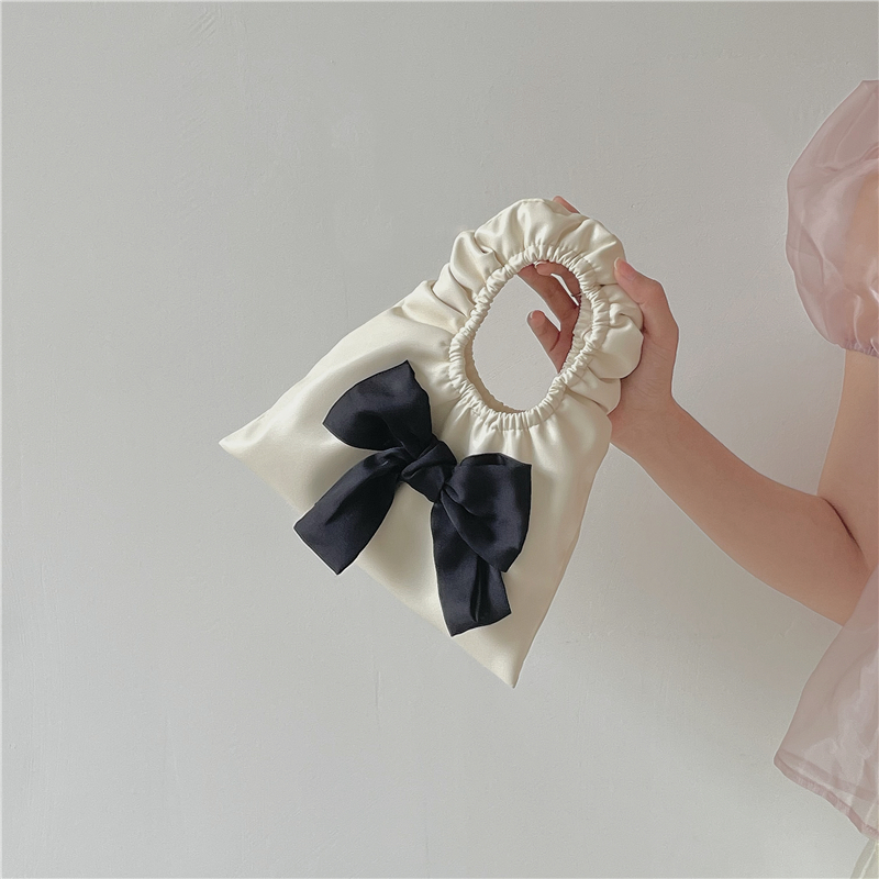 Mini-Tasche mit Schleife und Falten